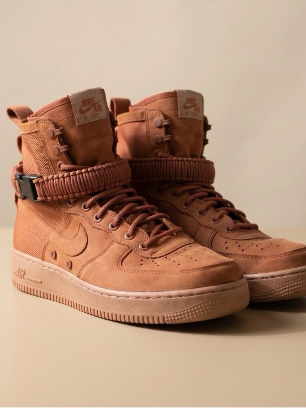 Women’s Nike Air Force One High-Top Sneakers in burnt orange